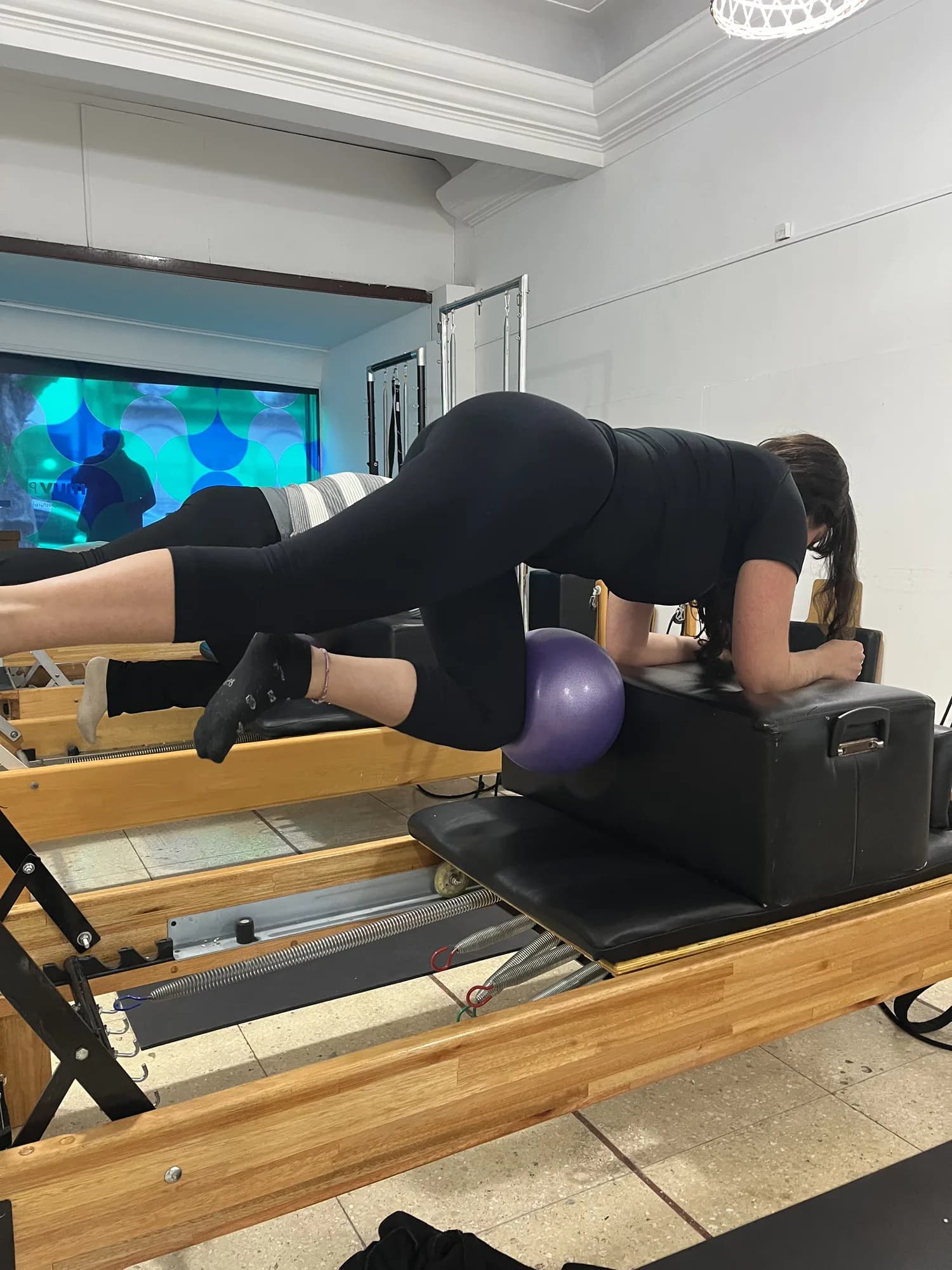 Alumna en clase de Pilates en MUV.
